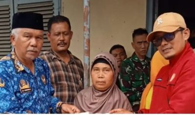 Kepala Dinas Sosial Kabupaten Garut, Drs. H. Aji Sukarmaji, M.Si. meninjau langsung penyaluran Bantuan Langsung Tunai Dana Bagi Hasil Cukai Tembakau ( BLT DBHCT ) di kantor pos Kadungora pada, Rabu, 17 Desember 2025.